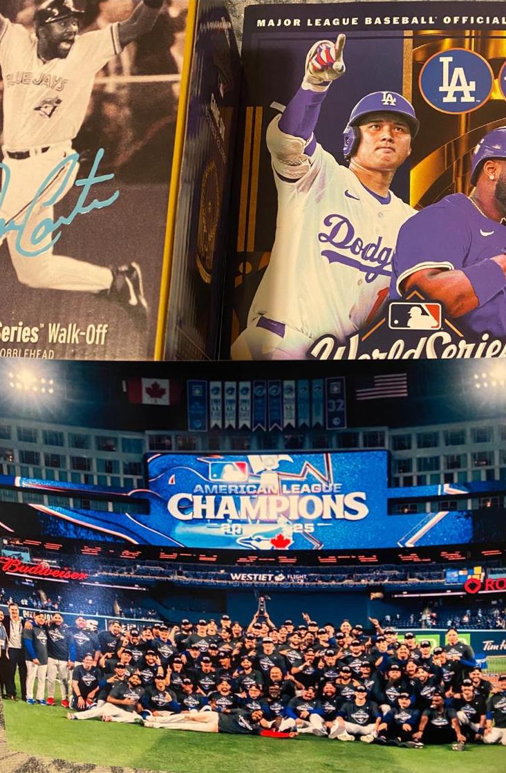 Joe Carter walk off home run autographed bobble head, 2025 Blue Jays World Series program and an unsigned AP Champions photo